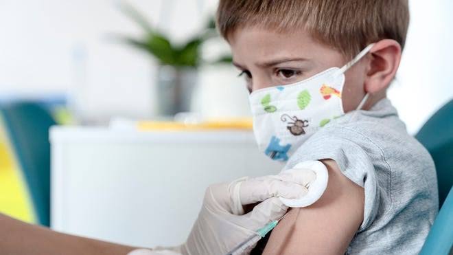 As the school year begins, here's what to know about flu, COVID shots - USA Today